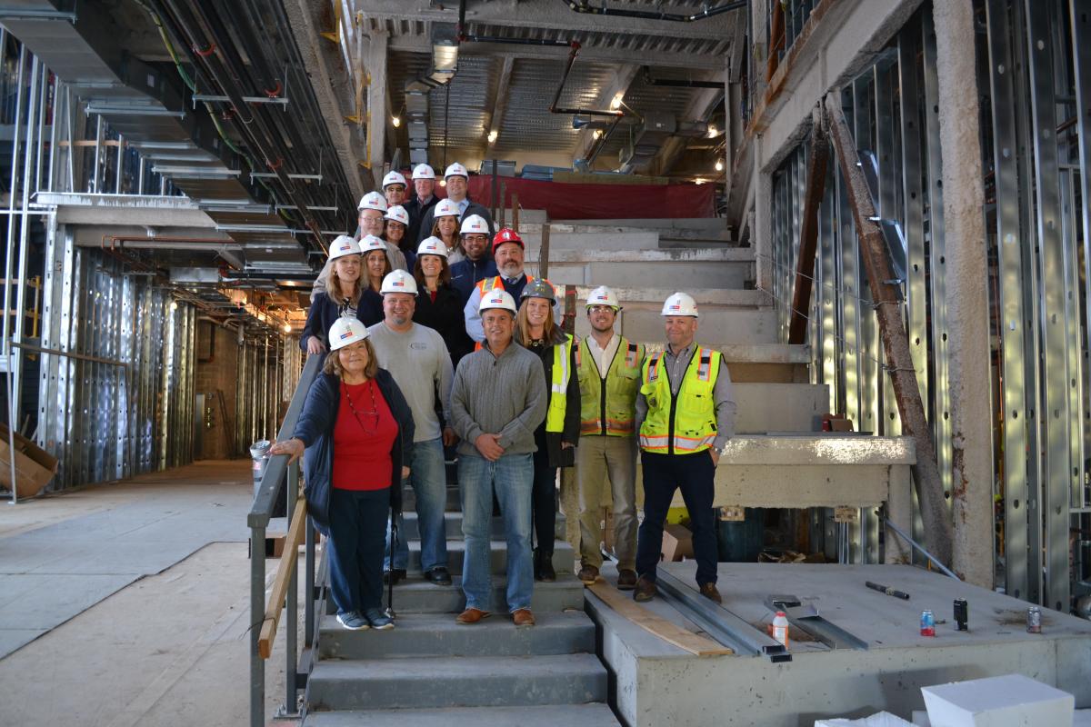 The Building Committee conducts a site visit on the Middle-High School in October 2019, admiring the construction progress.