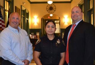 Town Manager Scott C. Crabtree and Police Chief Domenic DiMella welcome Police Officer Daniela Salinas 