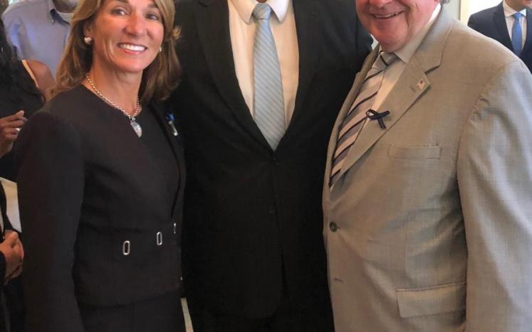 The Town Manager with Lt. Governor Karyn Polito (left) and House Speaker Robert DeLeo (right) at a Green Community ceremony.